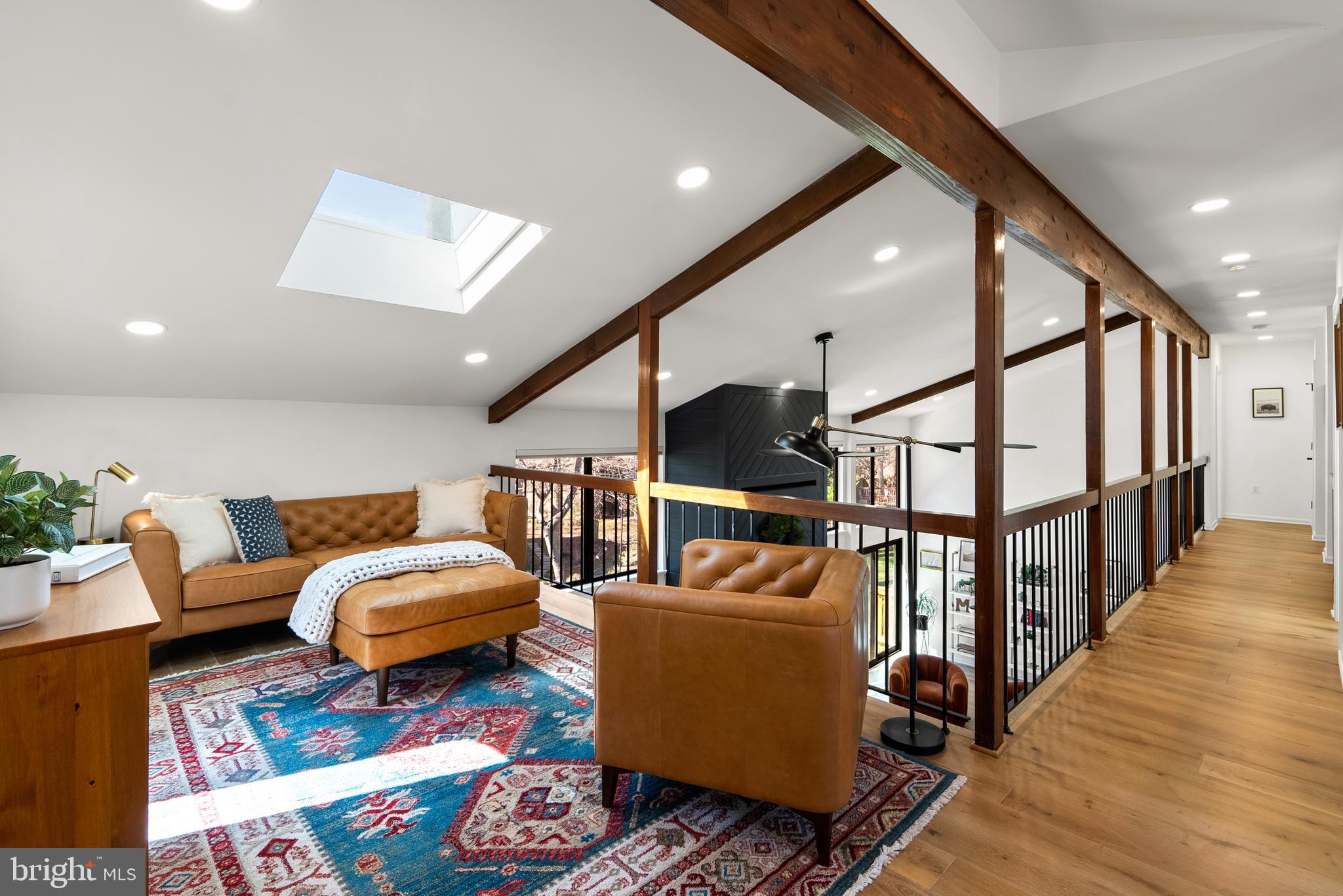 5213 Bradfield Drive Burke, VA 22015 - Photo 20 of 48 a living room with furniture and a wooden floor