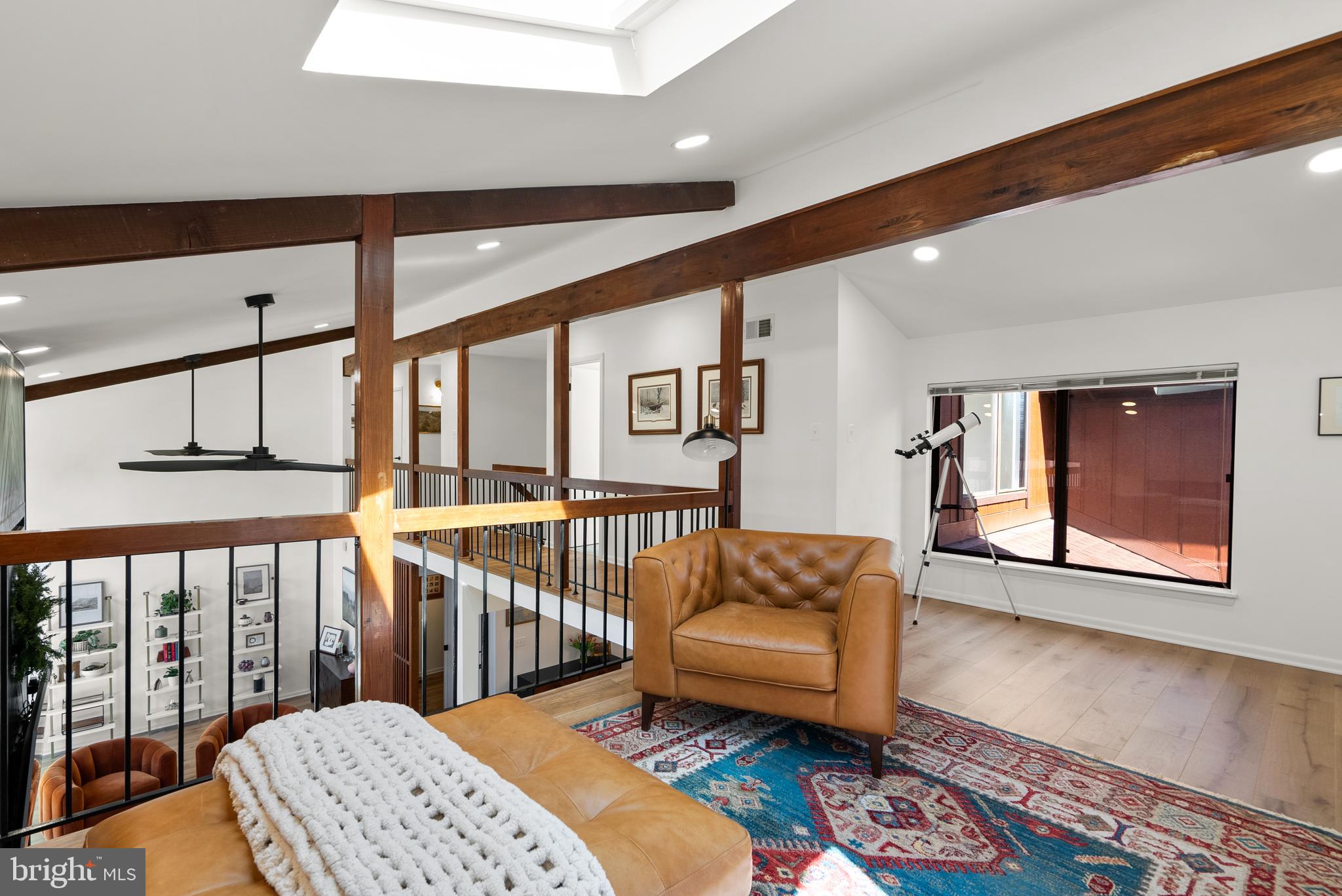 5213 Bradfield Drive Burke, VA 22015 - Photo 21 of 48 a living room with furniture and a window