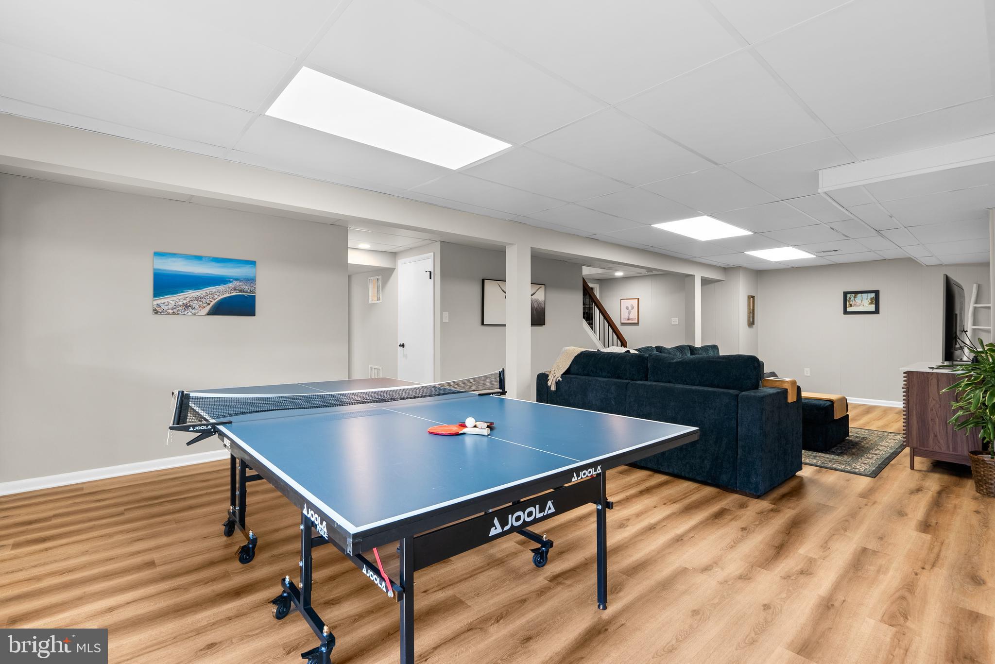 5213 Bradfield Drive Burke, VA 22015 - Photo 30 of 48 a living room with furniture pool table and window