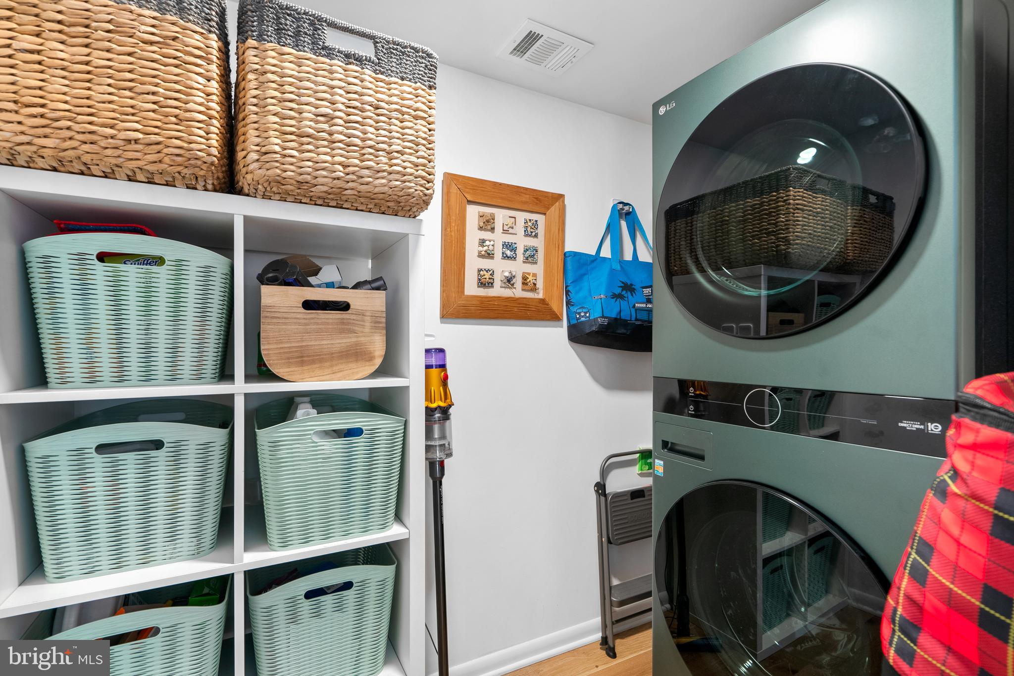 5213 Bradfield Drive Burke, VA 22015 - Photo 36 of 48 a utility room with dryer and washer