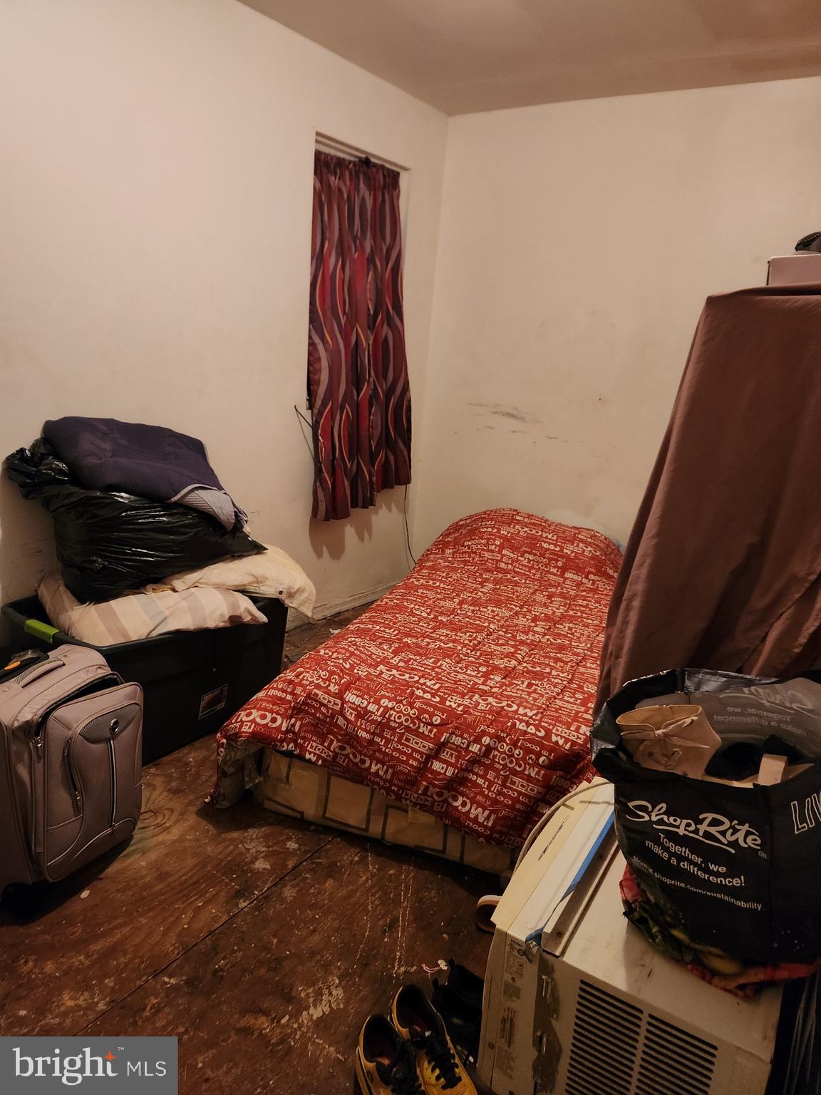 5347 Priscilla Street Philadelphia, PA 19144 - Photo 10 of 14 a bedroom with a bed and a closet