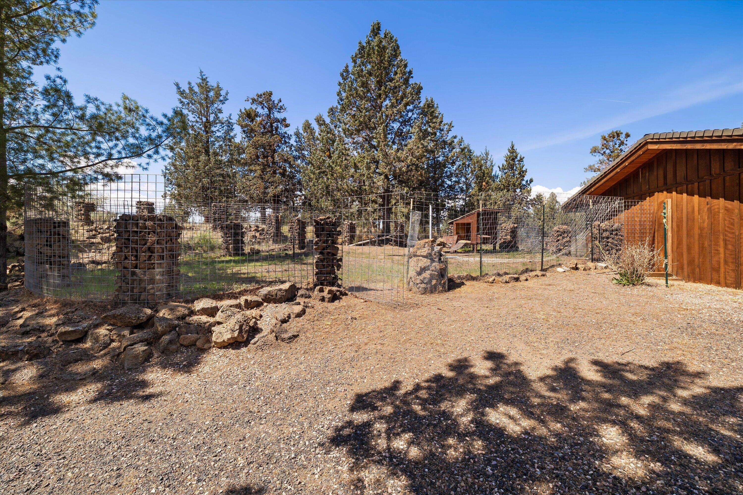 64155 Hunnell Road Bend, OR 97703 - Photo 65 of 96 Two separate enclosed pens formerly used for goats and chickens.