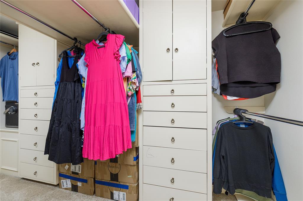 6126 Averill Way, Unit 103W Dallas, TX 75225 - Photo 17 of 34 a view of a walk in closet