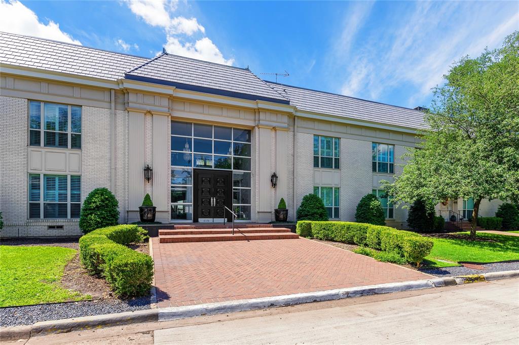 6126 Averill Way, Unit 103W Dallas, TX 75225 - Photo 26 of 34 front view of a house with a yard