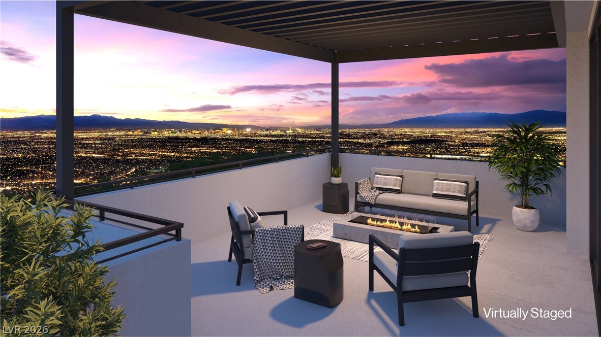 507 Overlook Rim Drive Henderson, NV 89012 - Photo 2 of 22 Perched high above, this exceptional wrap-around deck offers panoramic views of the strip, city lights and majestic mountains.