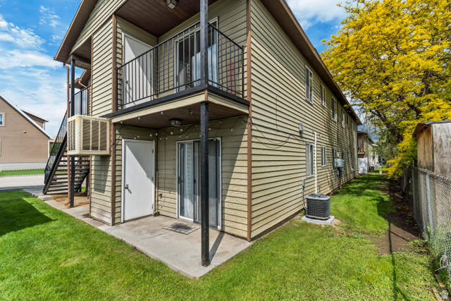 653 South 500 West, Unit 1 Provo, UT 84601 - Photo 3 of 17 Two-story structure with horizontal siding and a ground-level concrete patio
