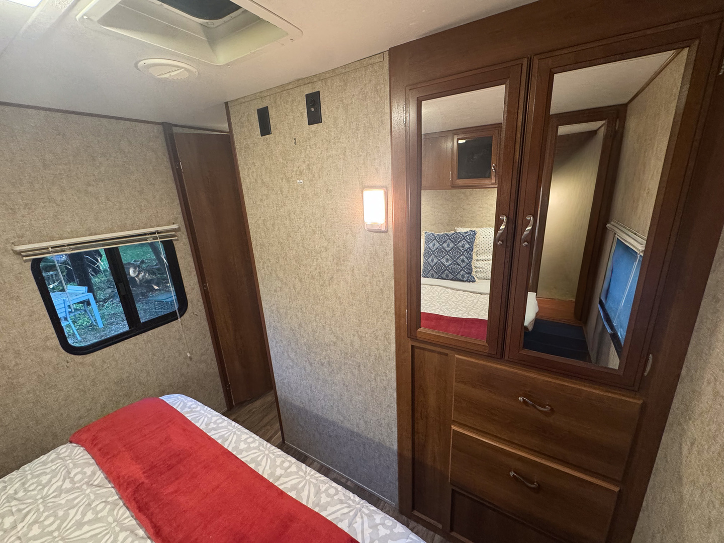 4-176 Woodhaven Sublette, IL 61367 - Photo 17 of 19 a bedroom with a bed and a mirror