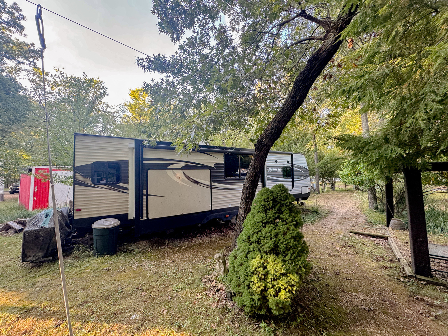 4-176 Woodhaven Sublette, IL 61367 - Photo 3 of 19 a house view with a backyard space