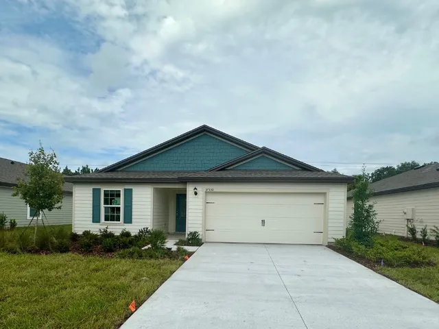 front view of house with a yard