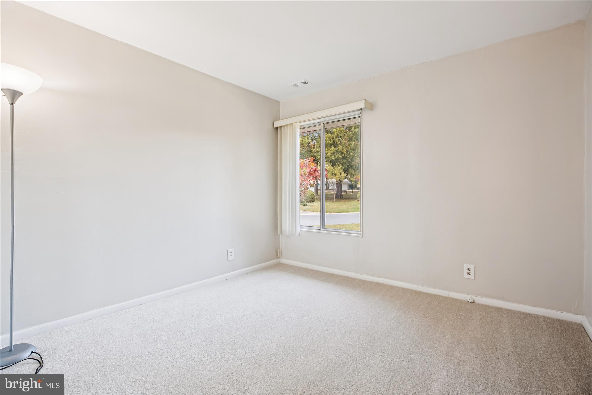 3220 Ludham Drive, Unit 196A Silver Spring, MD 20906 - Photo 15 of 28 a view of an empty room with a window