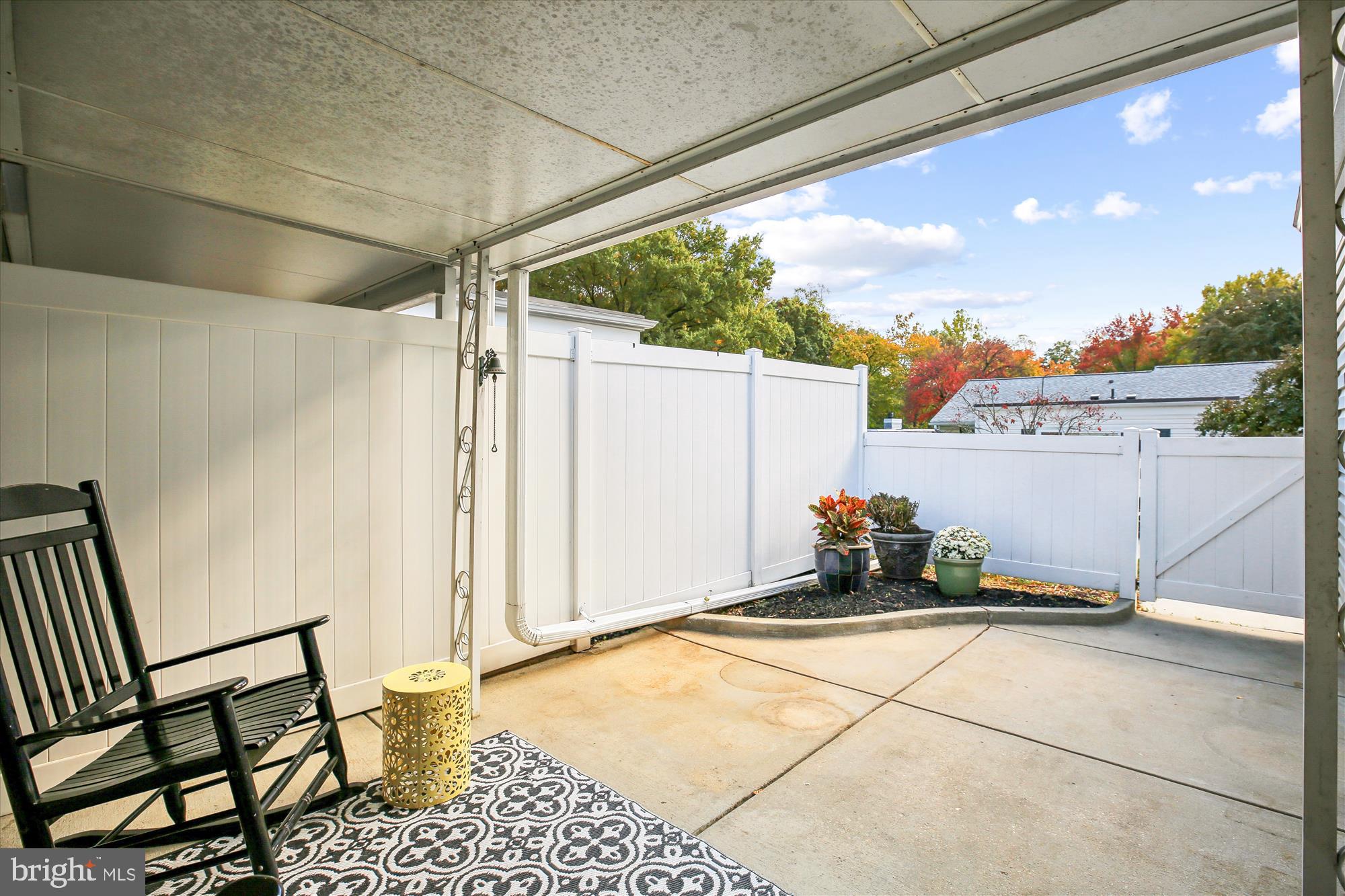 3220 Ludham Drive, Unit 196A Silver Spring, MD 20906 - Photo 17 of 28 a view of a porch with furniture and front door