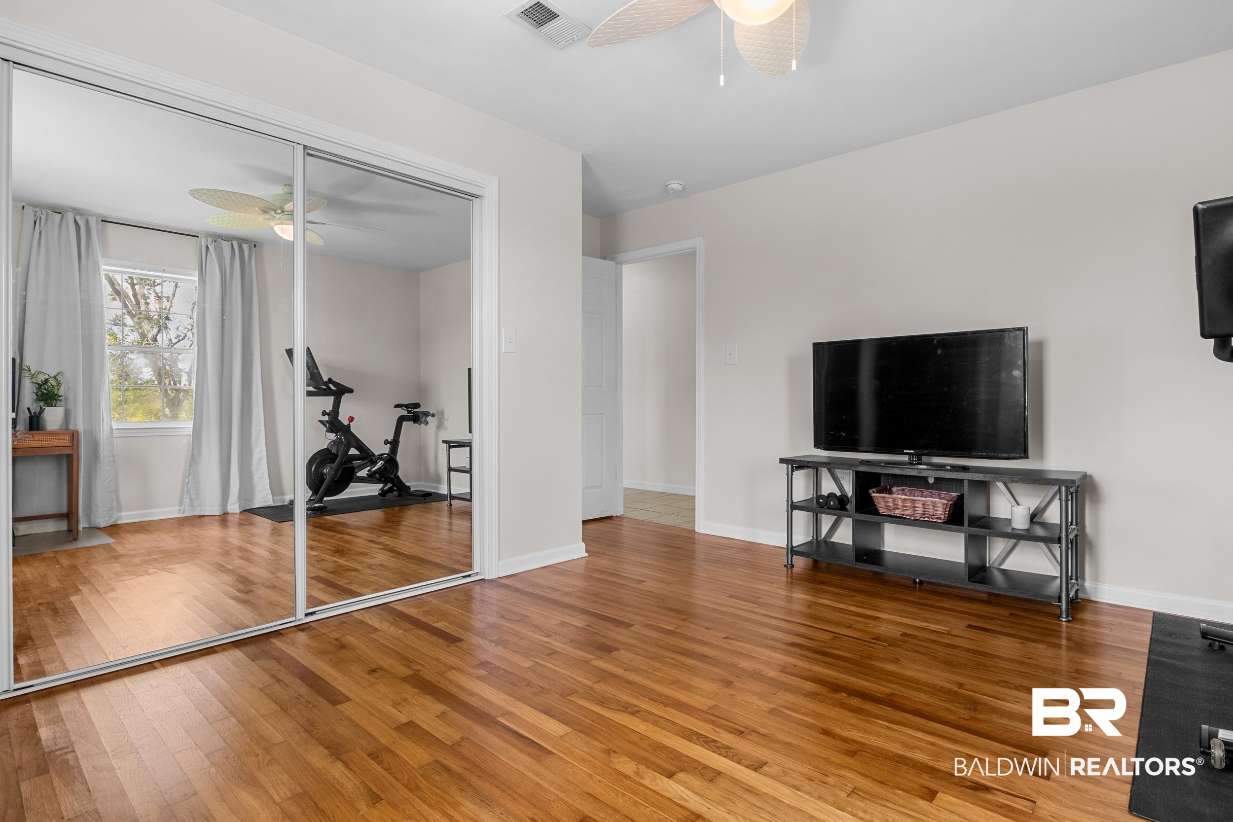 17689 Brewer Road Foley, AL 36535 - Photo 36 of 54 Exercise room with light hardwood / wood-style flooring and ceiling fan