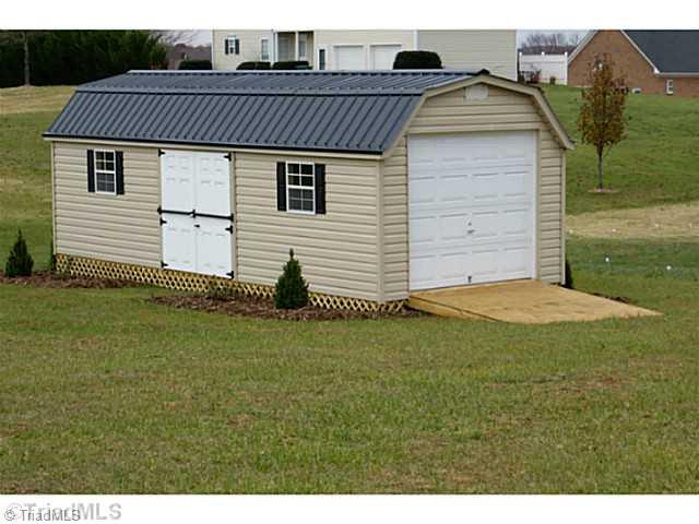 7482 Princess Ann Court Rural Hall, NC 27045 - Photo 14 of 16 Outbuilding. Building is 12 x 28. It is wired but electricity is not yet run to it.