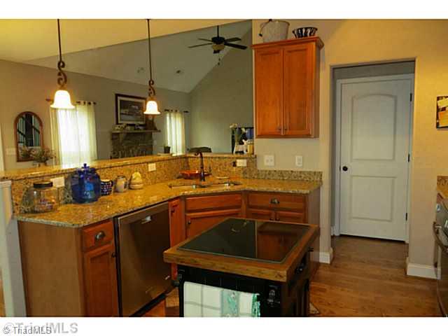 7482 Princess Ann Court Rural Hall, NC 27045 - Photo 3 of 16 Kitchen. Awesome kitchen with granite, stainless, Jenn air gas stove, pantry and more!
