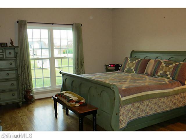 7482 Princess Ann Court Rural Hall, NC 27045 - Photo 8 of 16 Master Bedroom. Large owner en suite off the back.