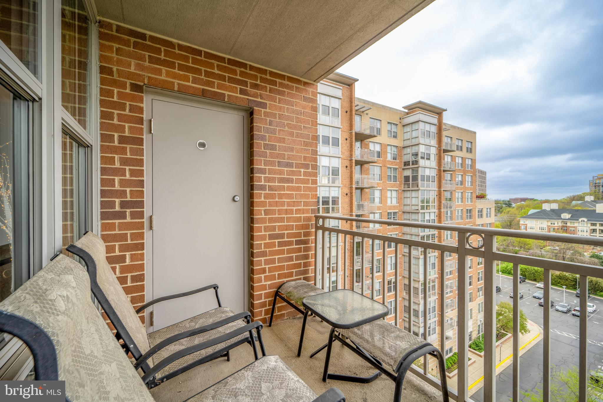 11800 Sunset Hills Road, Unit 925 Reston, VA 20190 - Photo 29 of 49 a view of a balcony with chairs