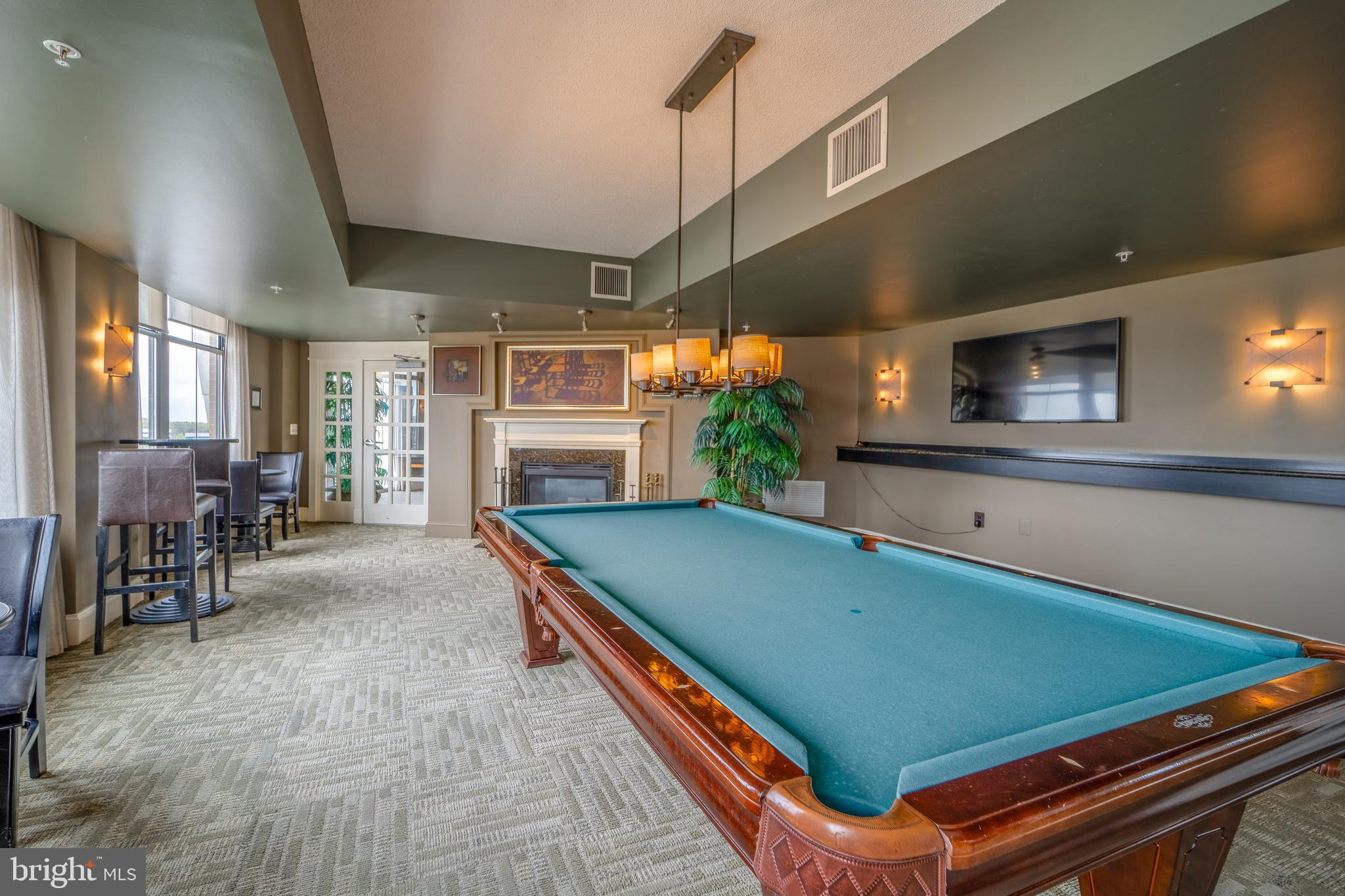 11800 Sunset Hills Road, Unit 925 Reston, VA 20190 - Photo 38 of 49 a room with pool table and windows