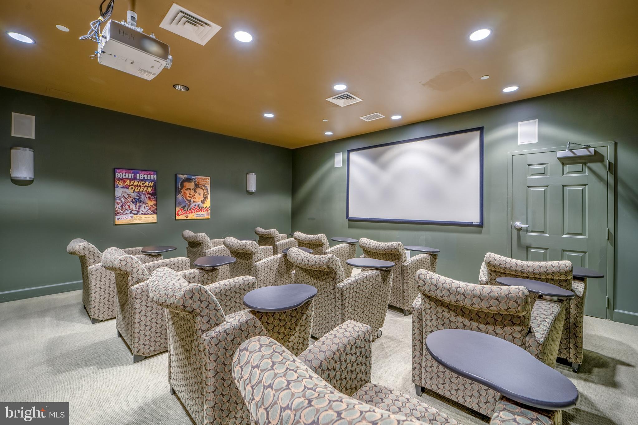 11800 Sunset Hills Road, Unit 925 Reston, VA 20190 - Photo 39 of 49 a living room with furniture and a flat screen tv
