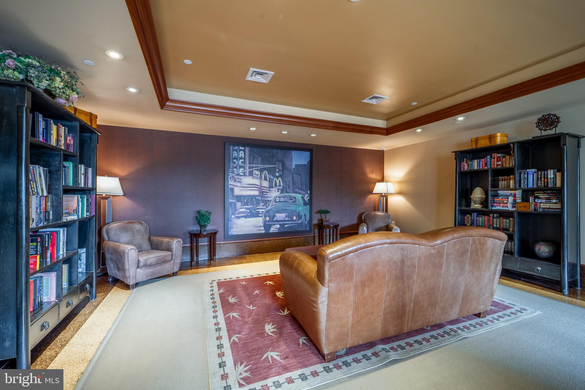 11800 Sunset Hills Road, Unit 925 Reston, VA 20190 - Photo 42 of 49 a living room with furniture and a bookshelf