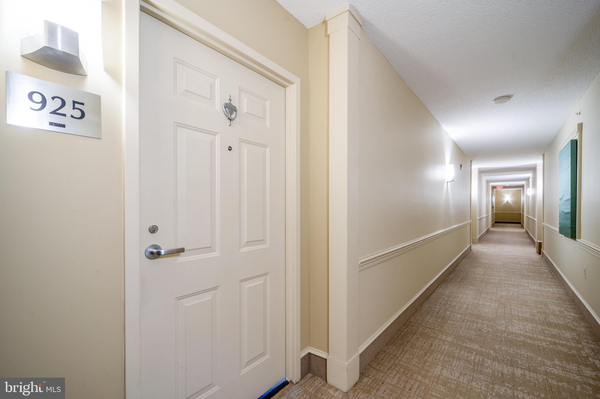 11800 Sunset Hills Road, Unit 925 Reston, VA 20190 - Photo 5 of 49 a view of a hallway with wooden floor