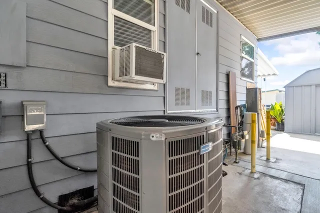a view of a backyard with sitting area