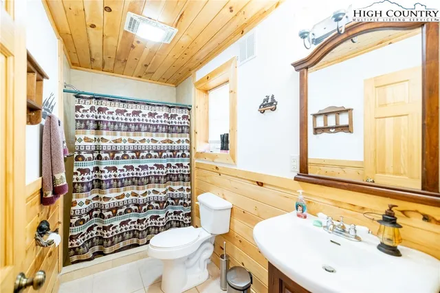 a balcony with wooden floor