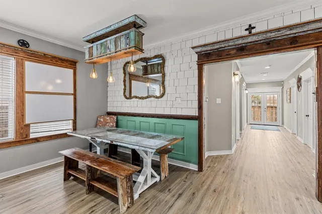 a room with furniture and wooden floor