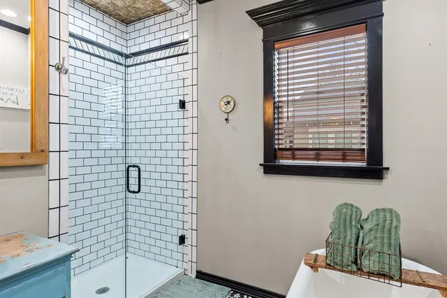 a bathroom with a sink and a shower