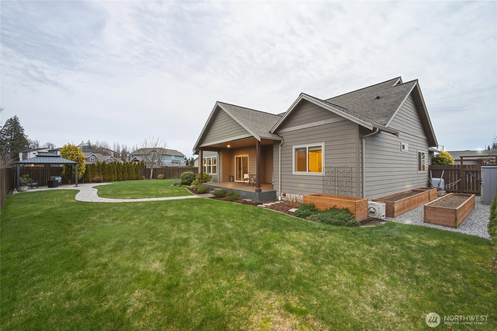 1476 Patriot Court Ferndale, WA 98248 - Photo 32 of 40 a front view of a house with a yard