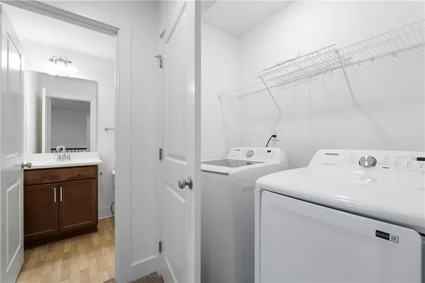 a utility room with dryer and washer