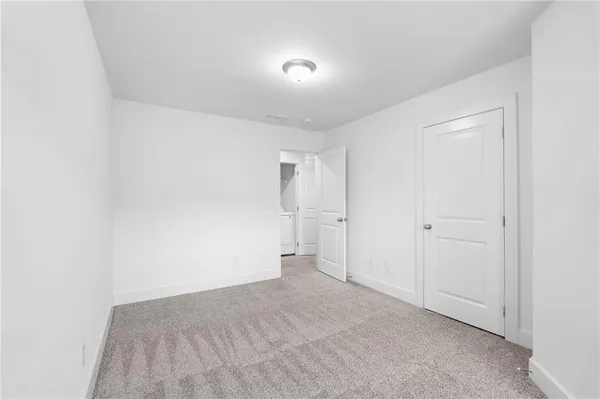 a view of hallway with stairs