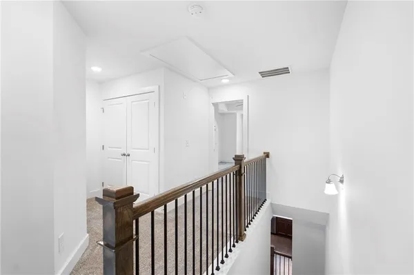 a view of a hallway with entryway