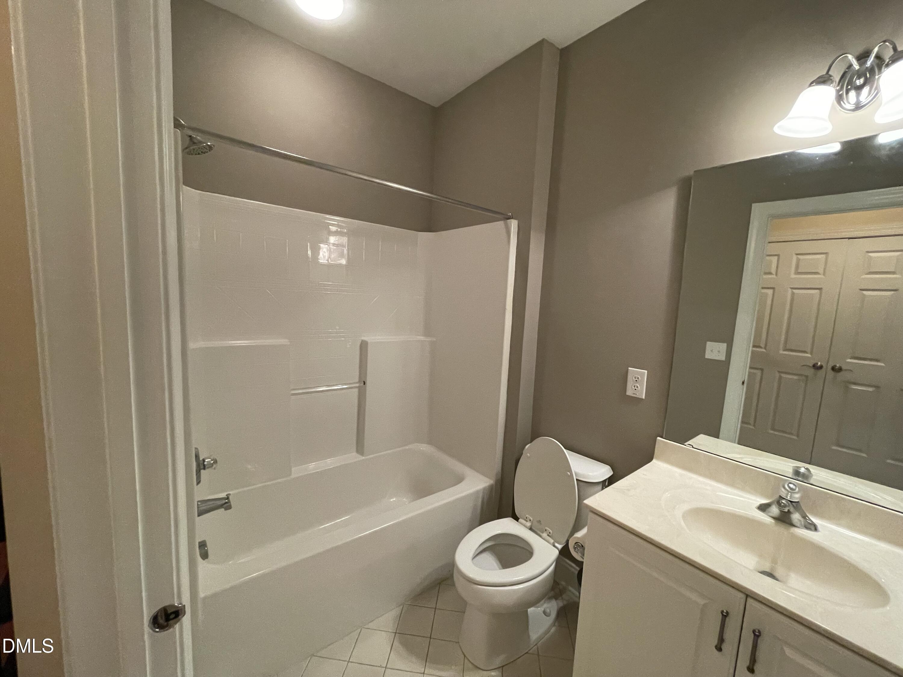 10411 Rosegate Court, Unit 3 Raleigh, NC 27617 - Photo 39 of 62 a bathroom with a sink a toilet and shower