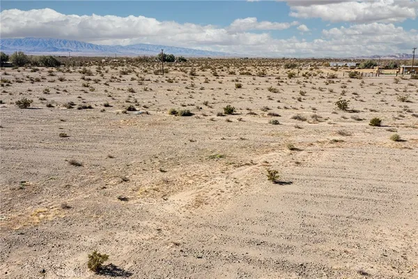 a view of ocean and mountain