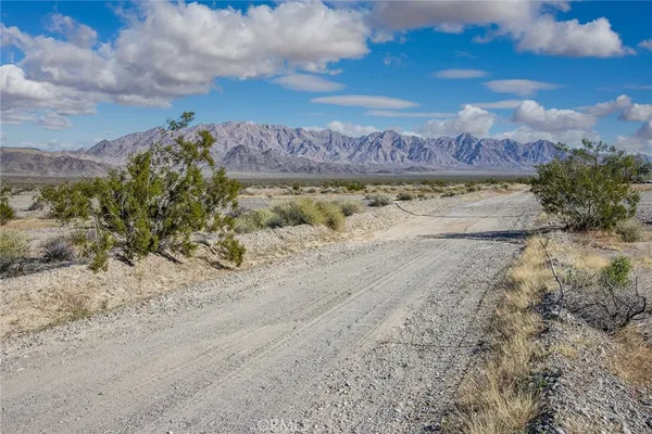 a view of a backyard with a mountain