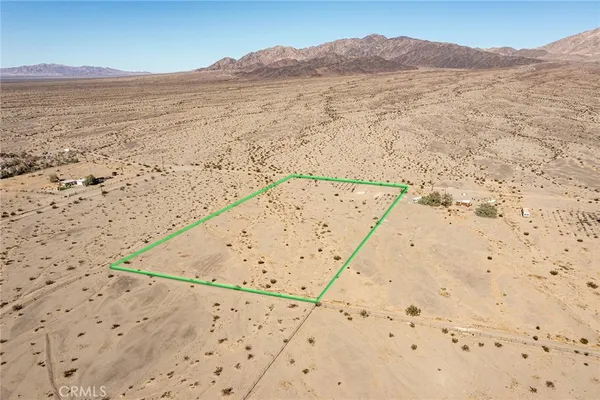 a view of ocean and mountain