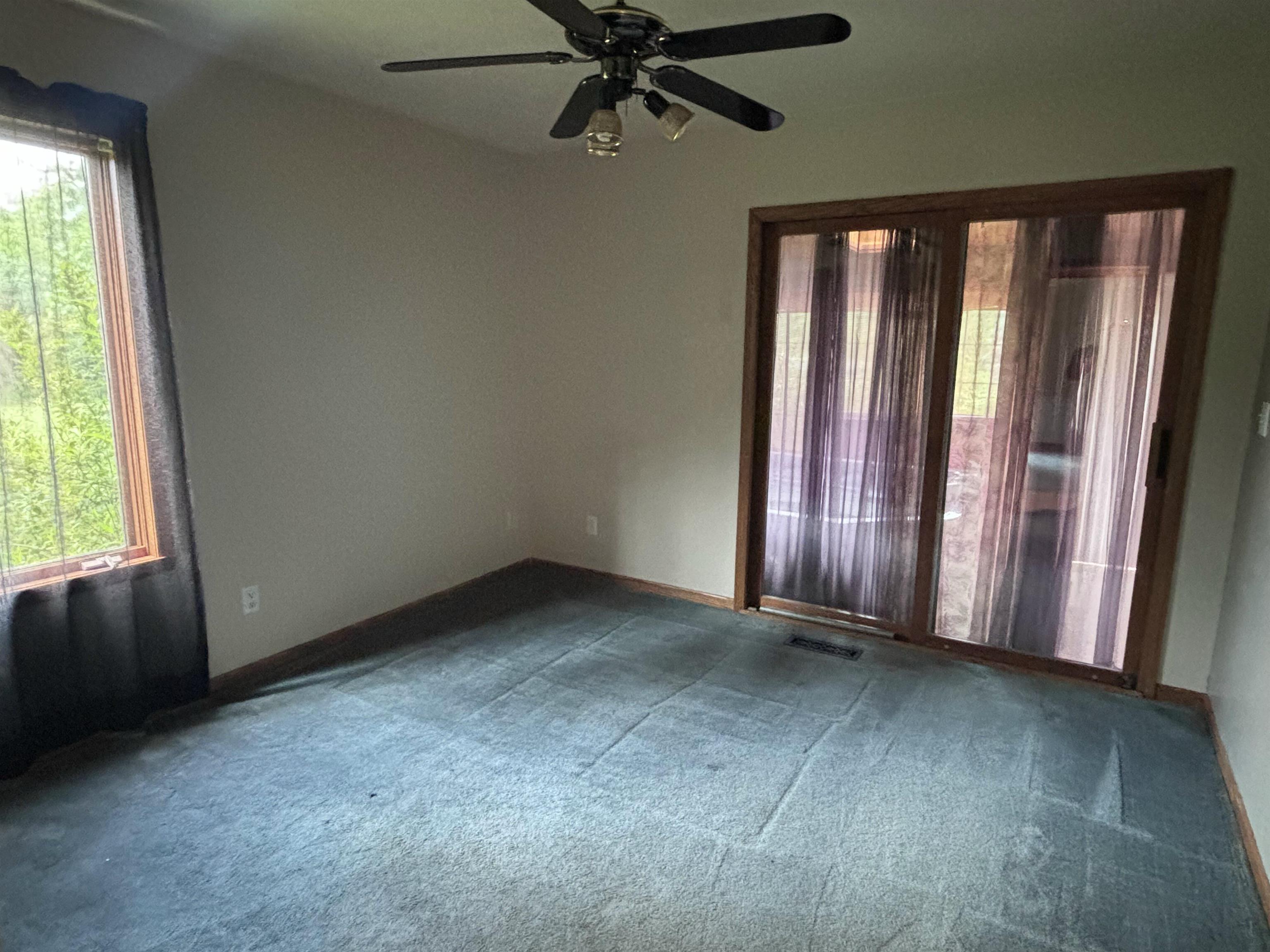 3543 Mill Road Cherry Valley, IL 61016 - Photo 14 of 46 a view of an empty room with a window