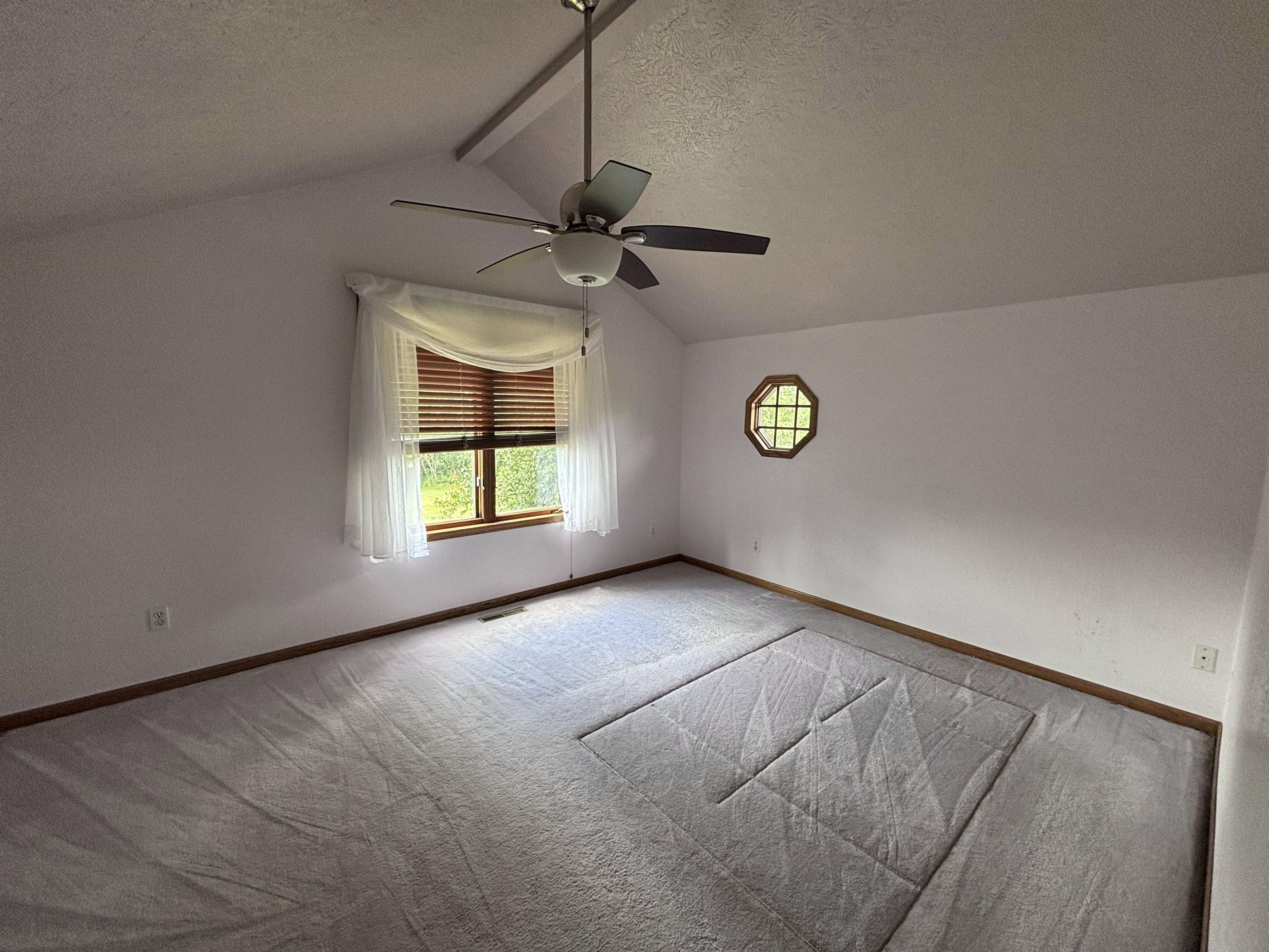 3543 Mill Road Cherry Valley, IL 61016 - Photo 17 of 46 a view of an empty room with a window