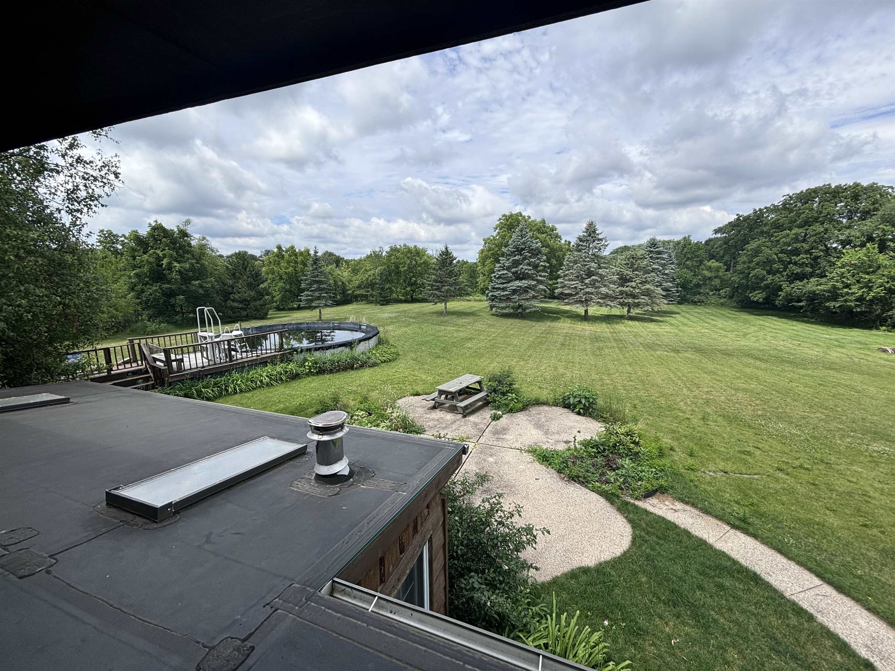 3543 Mill Road Cherry Valley, IL 61016 - Photo 21 of 46 a view of a lake with a yard