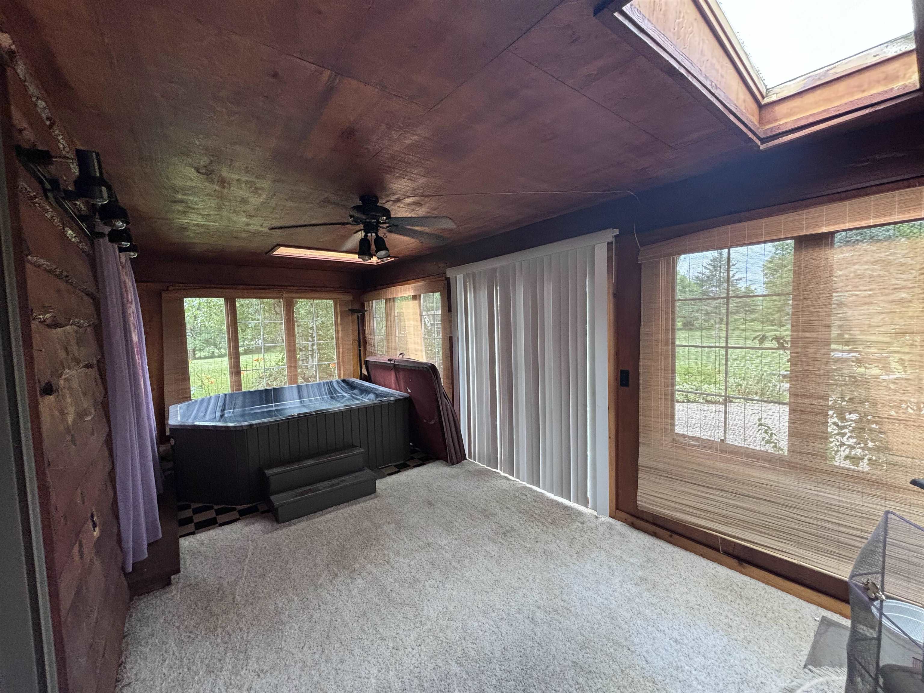 3543 Mill Road Cherry Valley, IL 61016 - Photo 23 of 46 a spacious bedroom with a bed and a large window