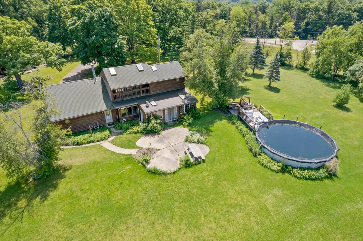 3543 Mill Road Cherry Valley, IL 61016 - Photo 25 of 46 an aerial view of a house with yard swimming pool and outdoor seating