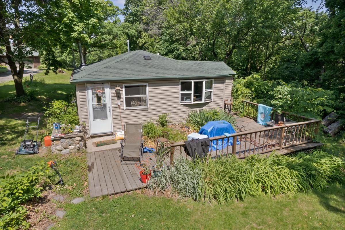 3543 Mill Road Cherry Valley, IL 61016 - Photo 28 of 46 a view of a house with a yard and sitting area