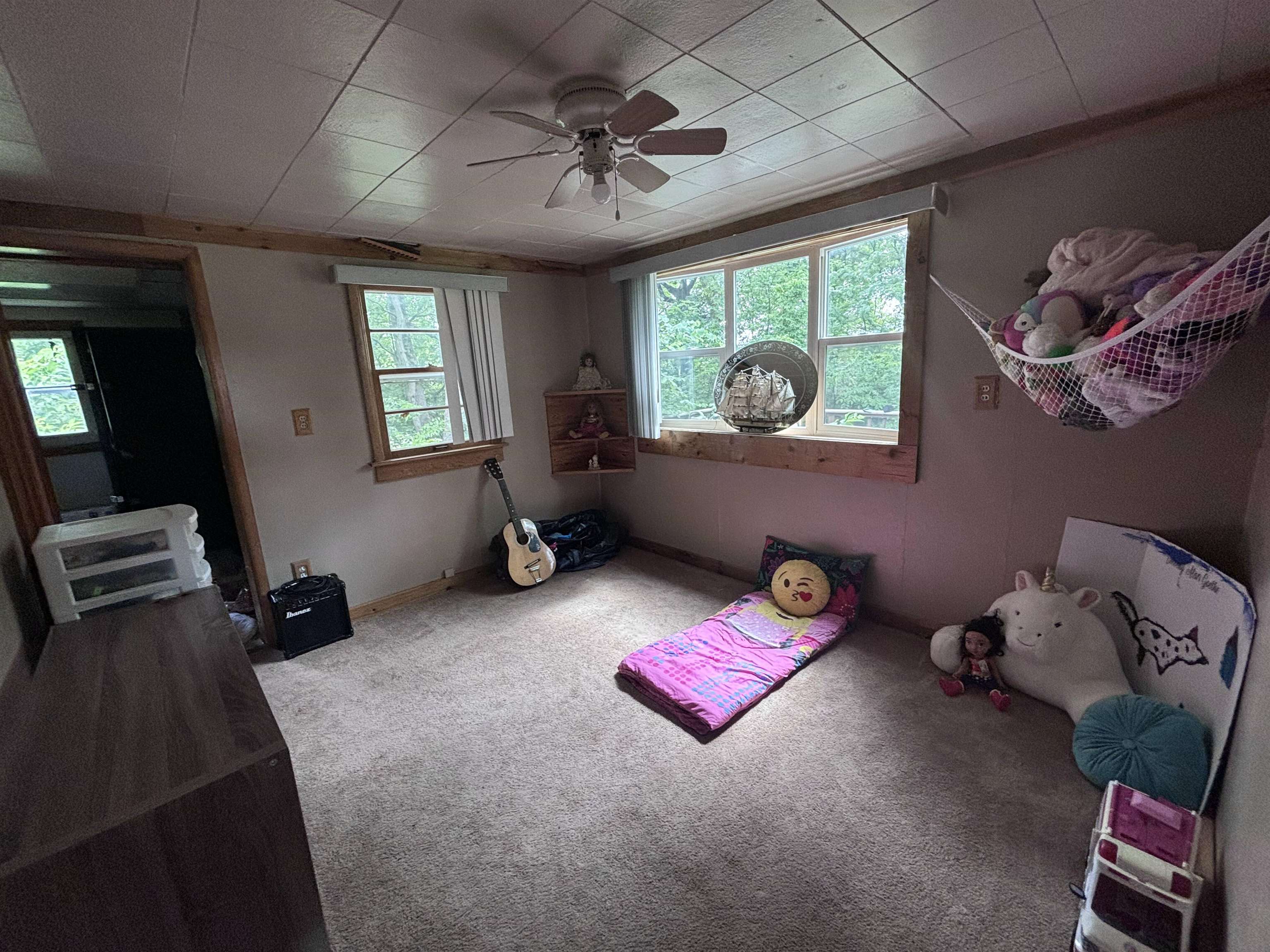 3543 Mill Road Cherry Valley, IL 61016 - Photo 33 of 46 a living room with furniture and a window