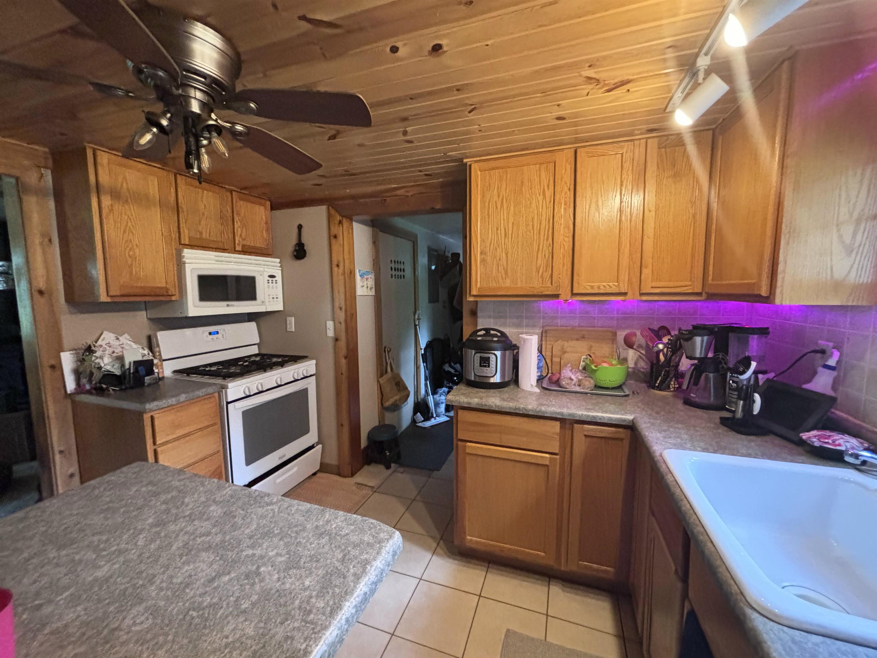 3543 Mill Road Cherry Valley, IL 61016 - Photo 36 of 46 a kitchen with a sink appliances and cabinets