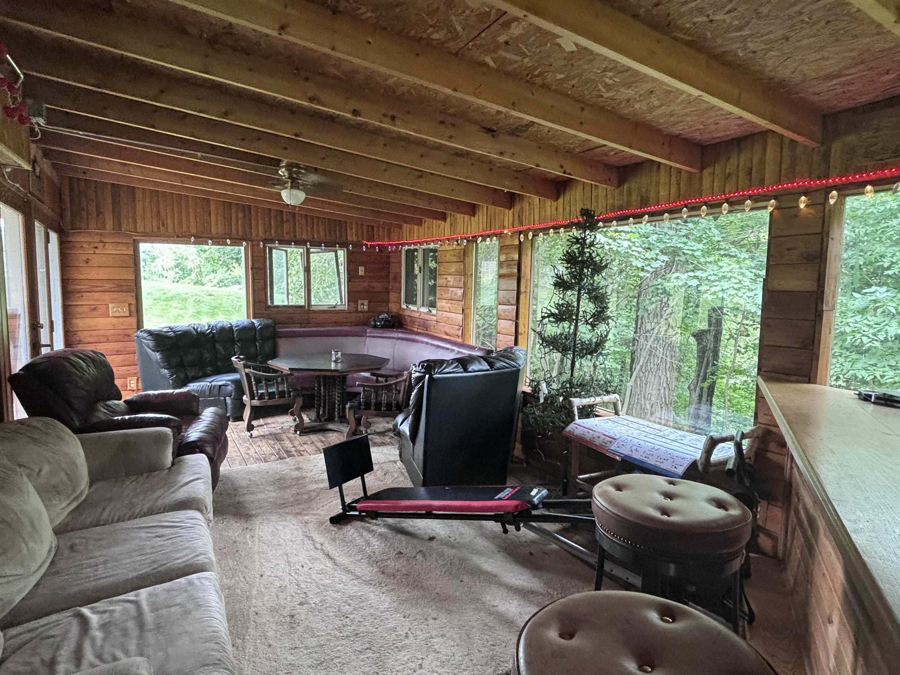 3543 Mill Road Cherry Valley, IL 61016 - Photo 43 of 46 a living room with furniture and a large window