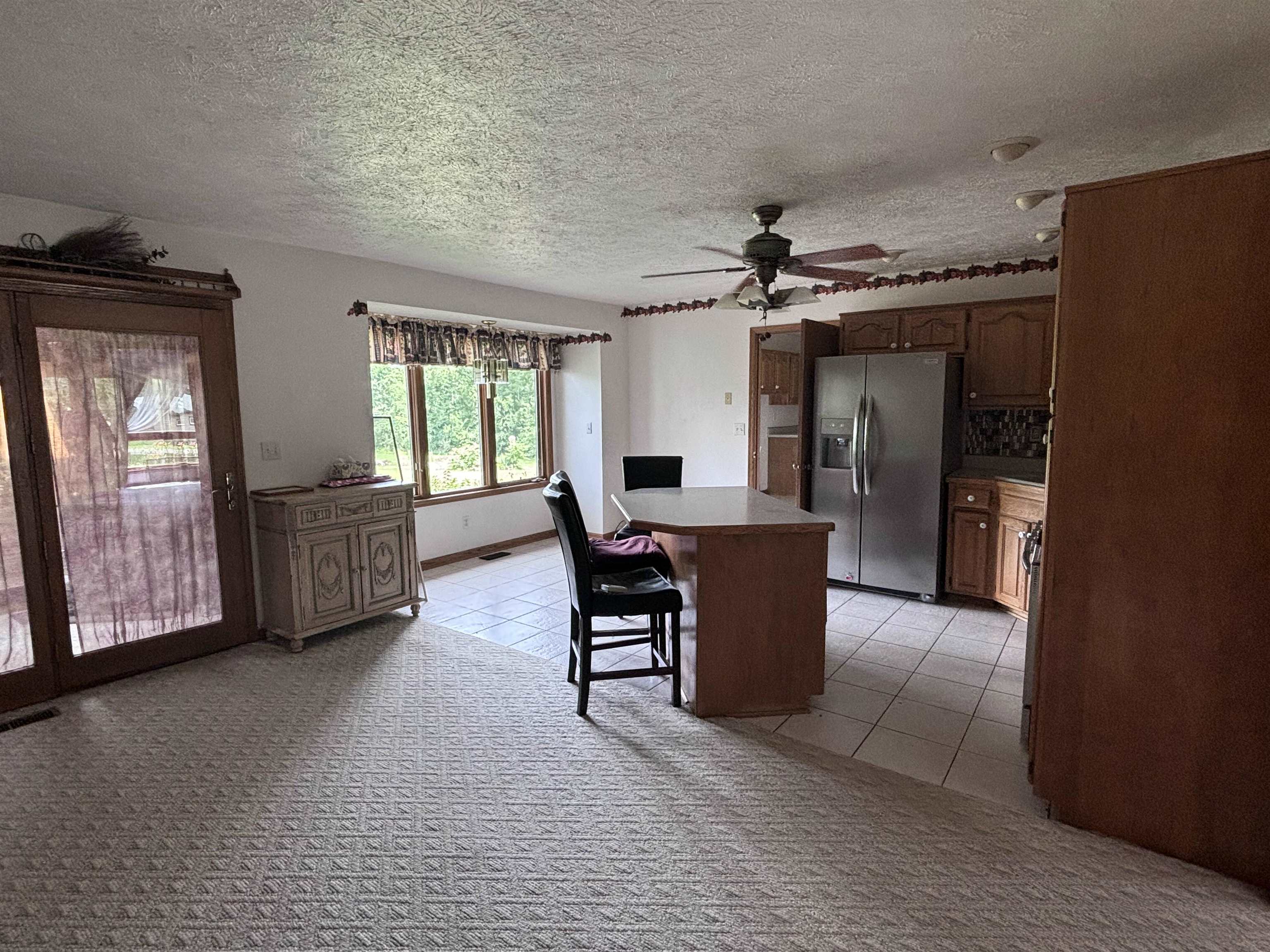 3543 Mill Road Cherry Valley, IL 61016 - Photo 6 of 46 a living room with furniture and a window