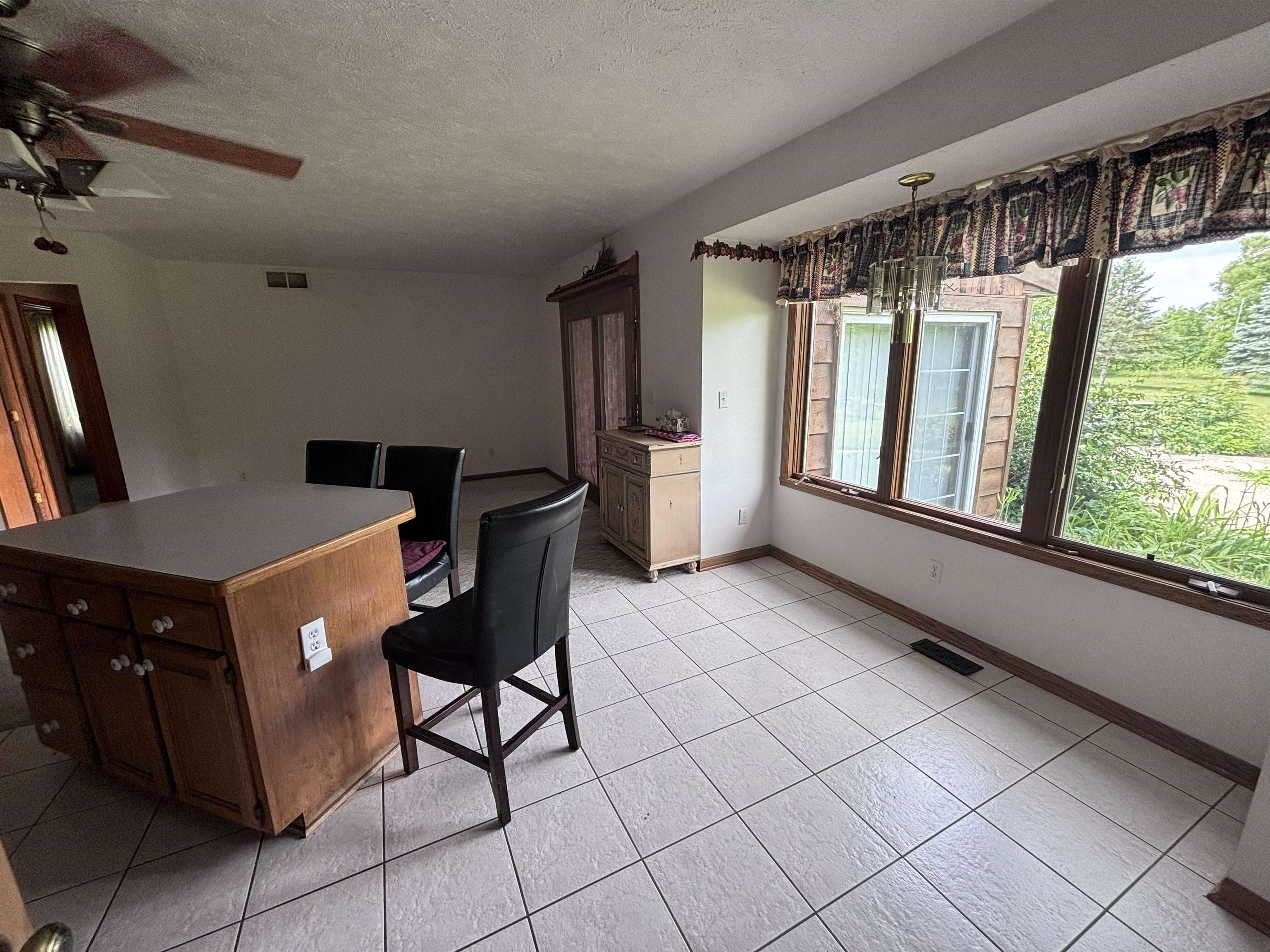 3543 Mill Road Cherry Valley, IL 61016 - Photo 8 of 46 a workspace with furniture and window