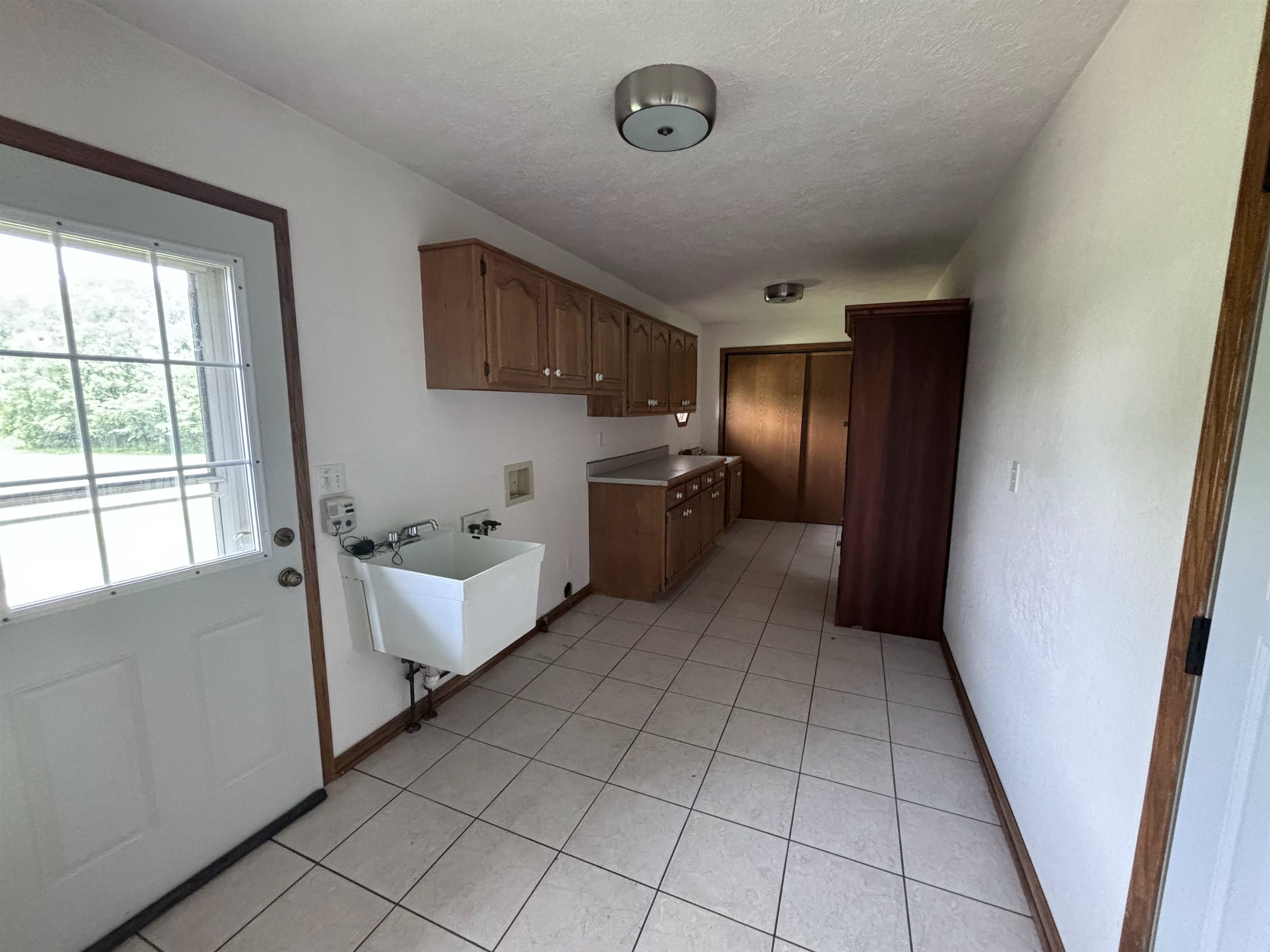 3543 Mill Road Cherry Valley, IL 61016 - Photo 9 of 46 a room with a bed and a window