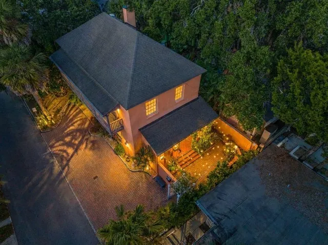 a view of a swimming pool with an outdoor seating