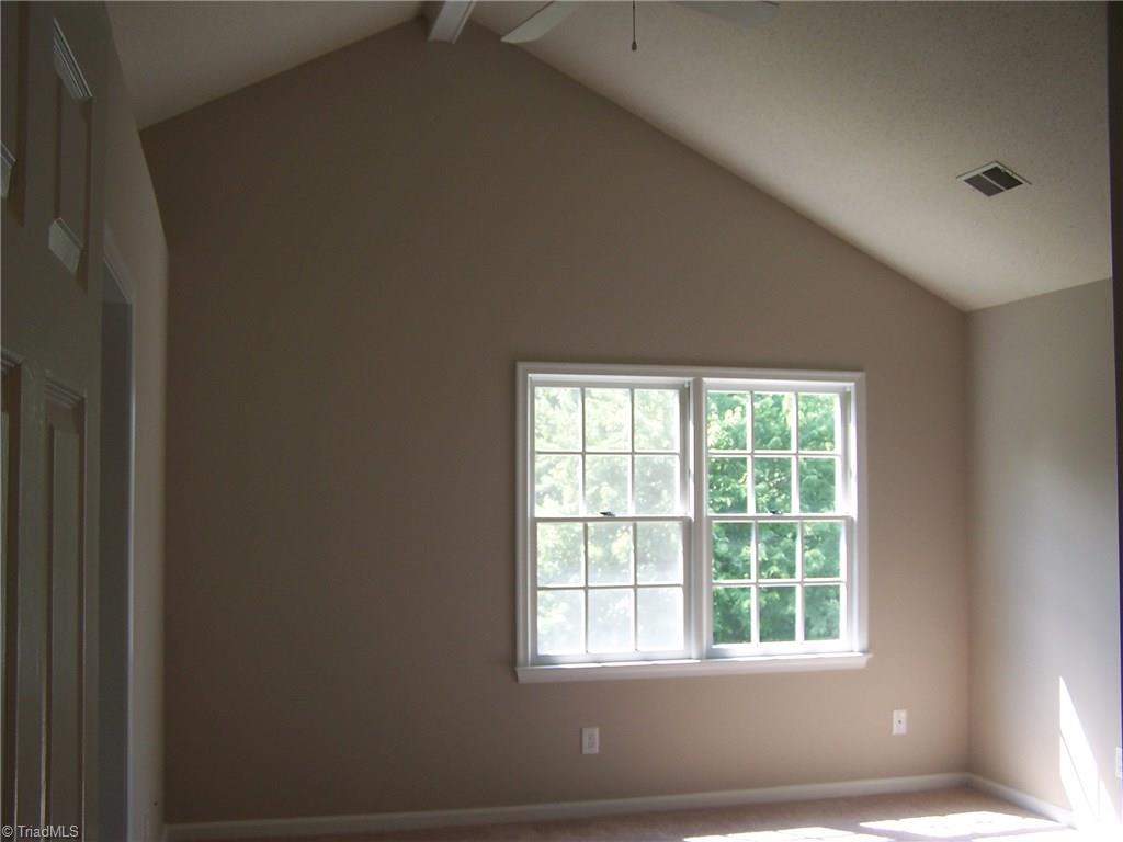 5902 High View Road Greensboro, NC 27410 - Photo 25 of 30 Master bedroom with Vaulted ceiling